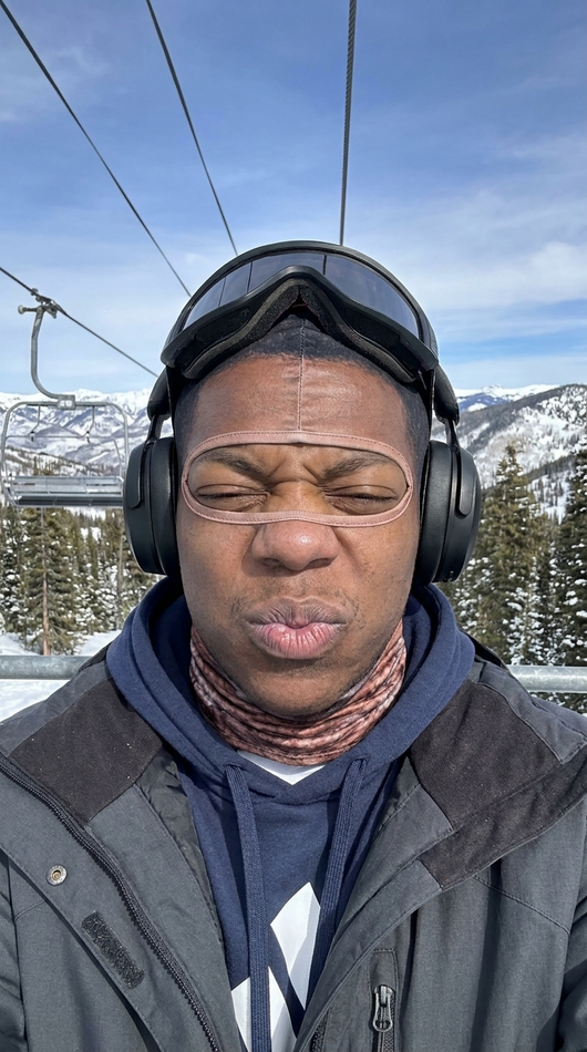 The Streamer face ski mask on the chairlift